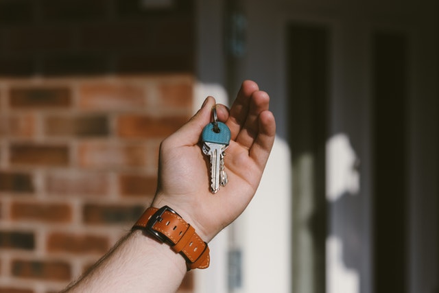 A Man Holding the Key to Their New Charlottesville, VA Home